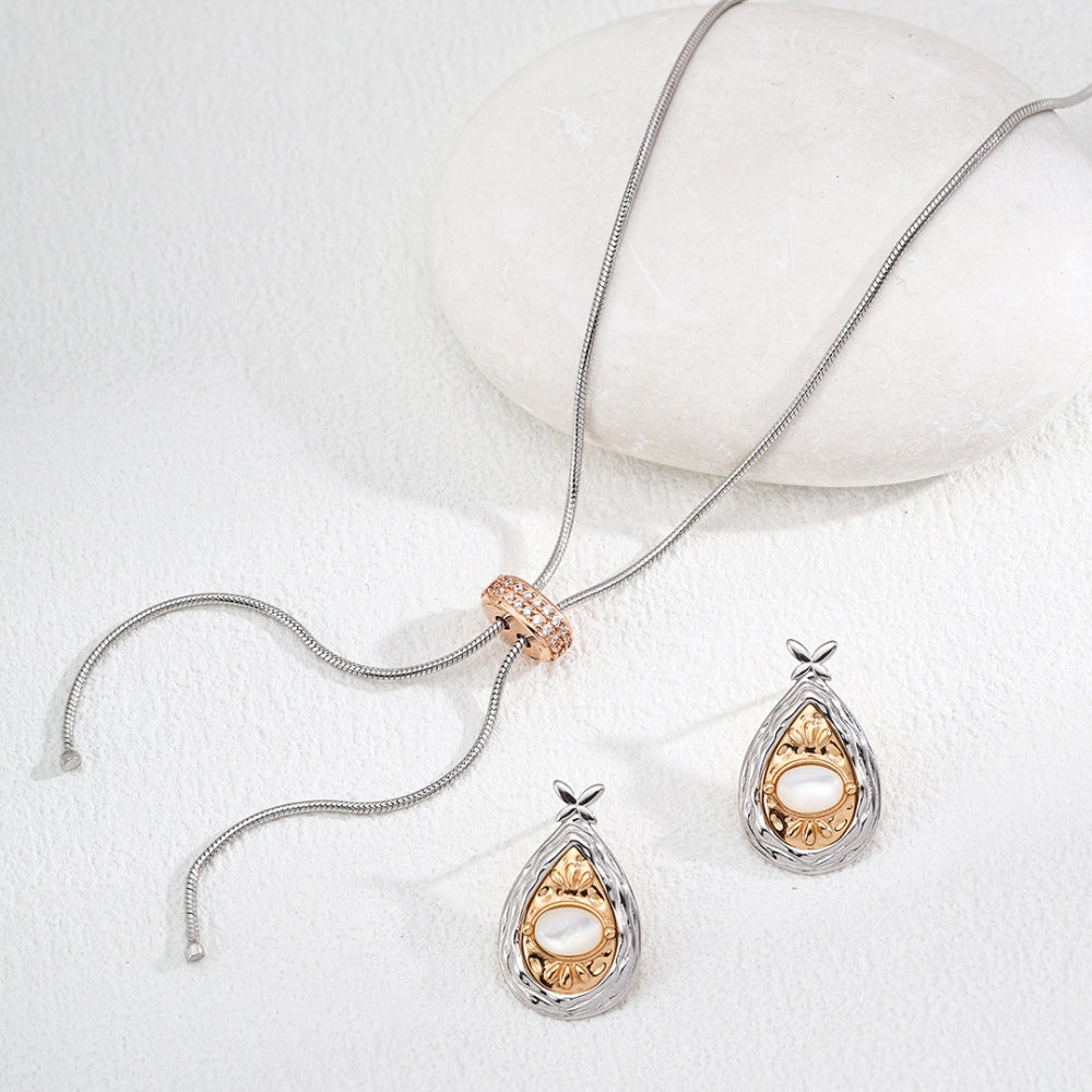Vintage Elegance Gold and Silver Floral Drop Earrings